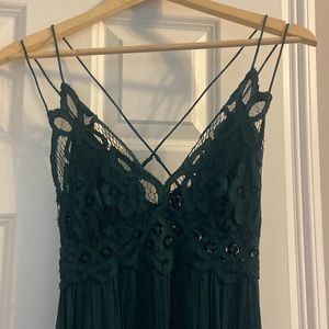 Beautiful NEW with tags! This green dress is stunning! Free People